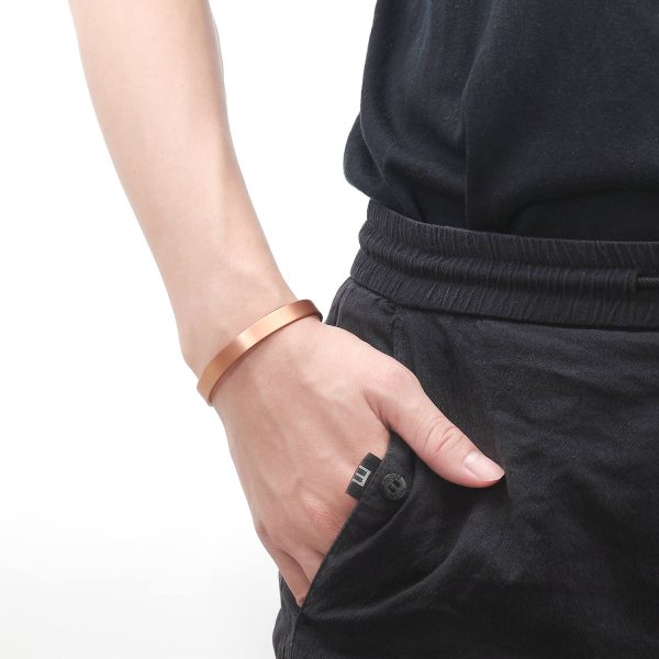 wearing copper therapy bracelet