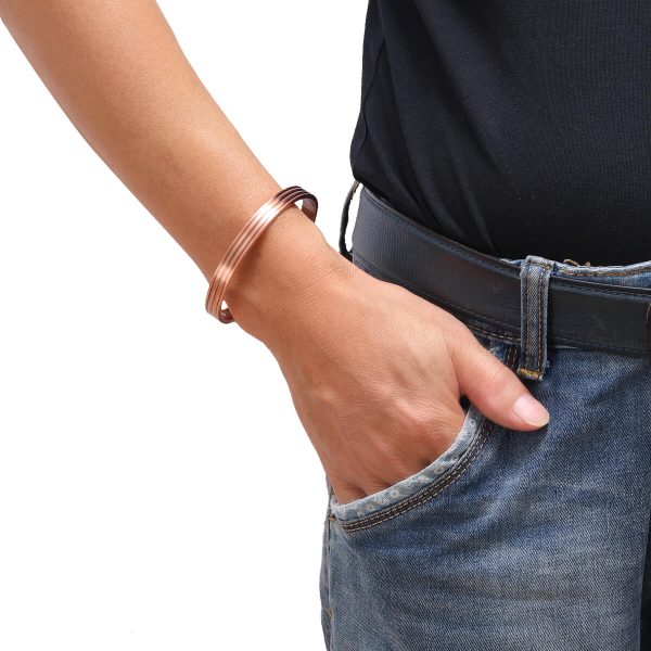wearing copper therapy bracelet